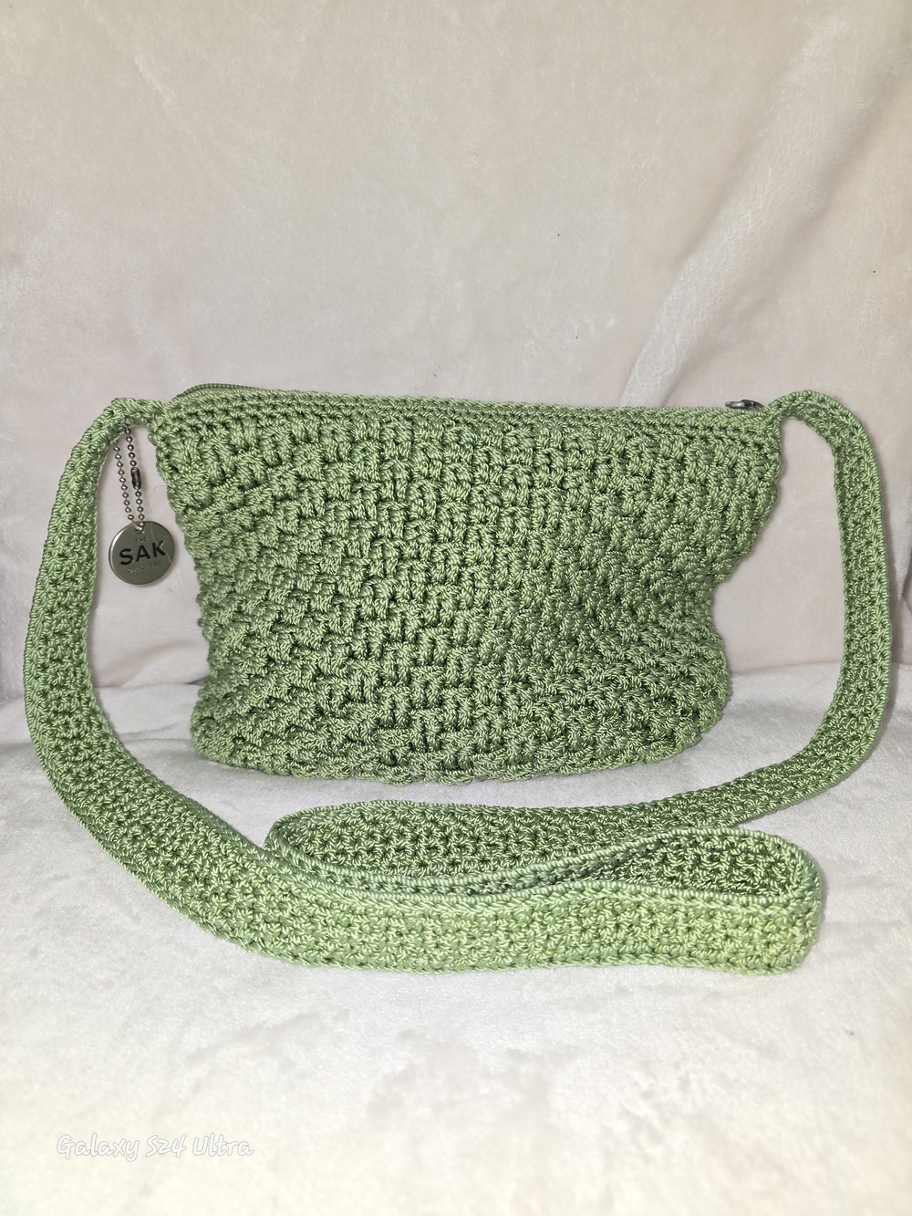 The Sak Crochet Crossbody Bag in Sage Green